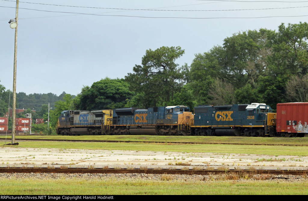 CSX 7898 leads train F769 down track 1 as train L034 passes by